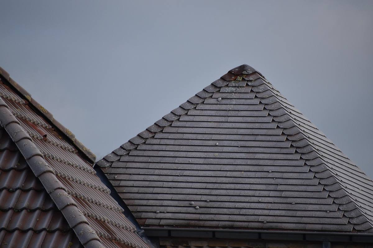 Cleanly laid slate pitched roof hip